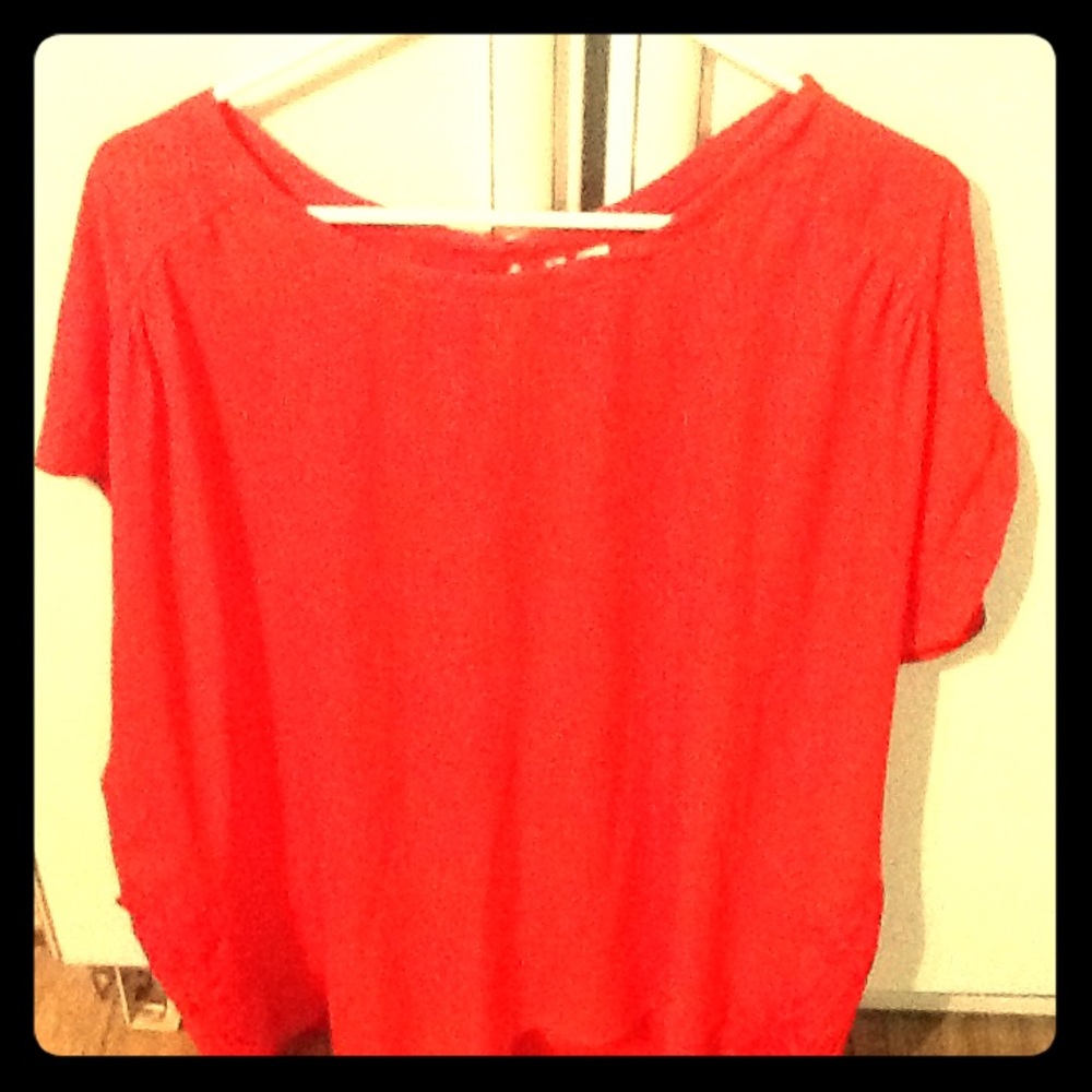 Red high low blouse.